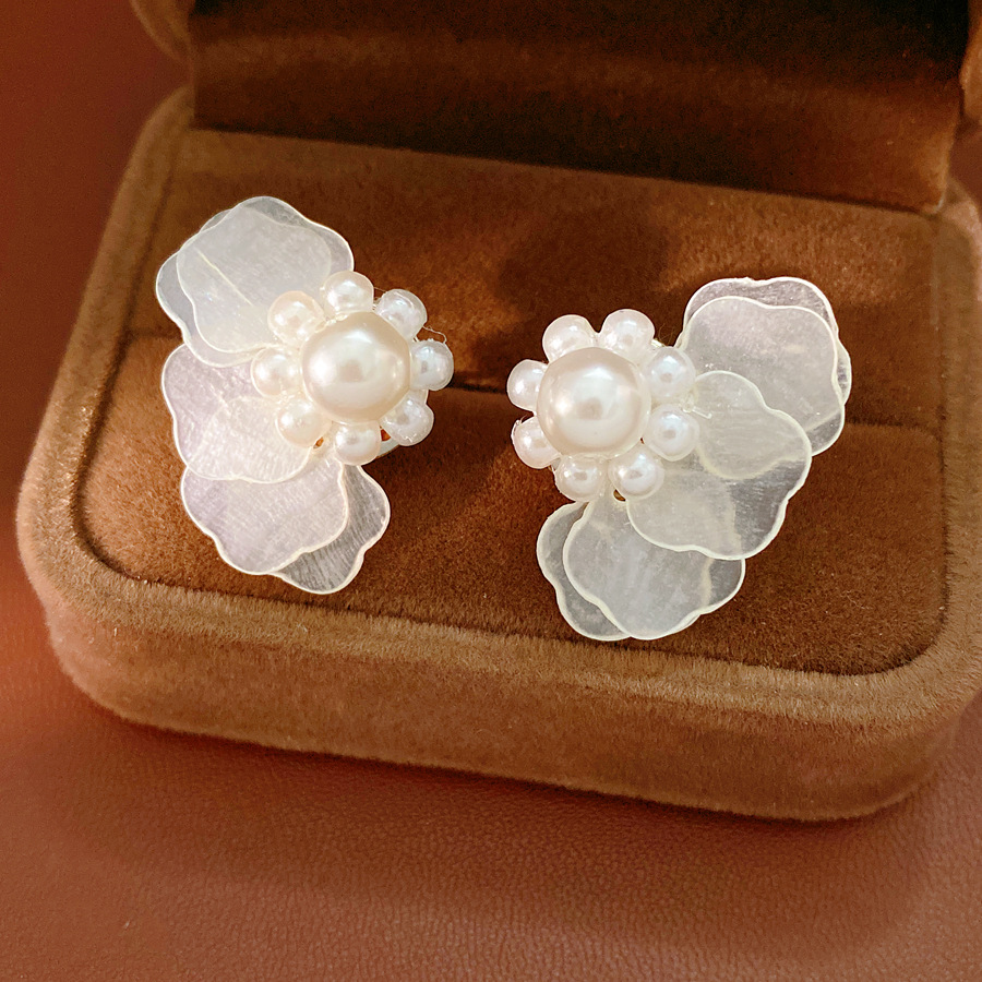 Layered Star-shaped Shell Stud - Cluster Stud Ear recension och pris